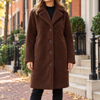 Dark Brown overcoats worn on a Washington DC street.