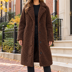 Dark Brown overcoats worn on a Washington DC street.