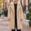 Cream overcoats worn on a Washington DC street.