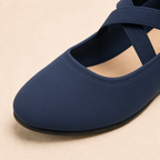Close-up navy blue suede flat
