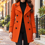 Orange trench coat worn on a Washington DC street.