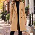 Beige trench coat worn on a Washington DC street.