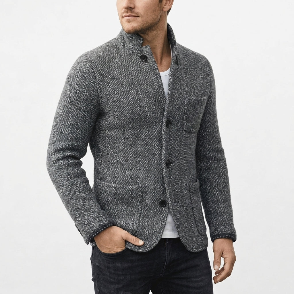 Overcoat in Gray showing the buttoned front and classic longline shape