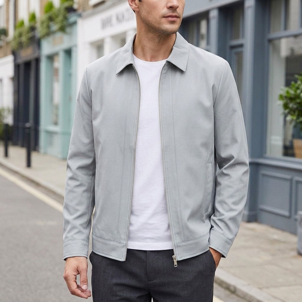 Zip Jacket in Gray showing the pointed collar and full-length zip